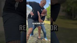 Watch your back! Get out of this headlock.